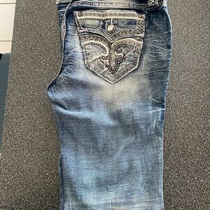 Rock Revival Jeans- Worn once. Stylish Blue Denim Jeans with Embroidered Pocket